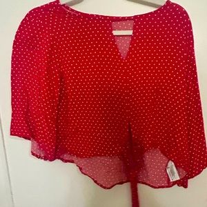 Red polka dot women’s blouse